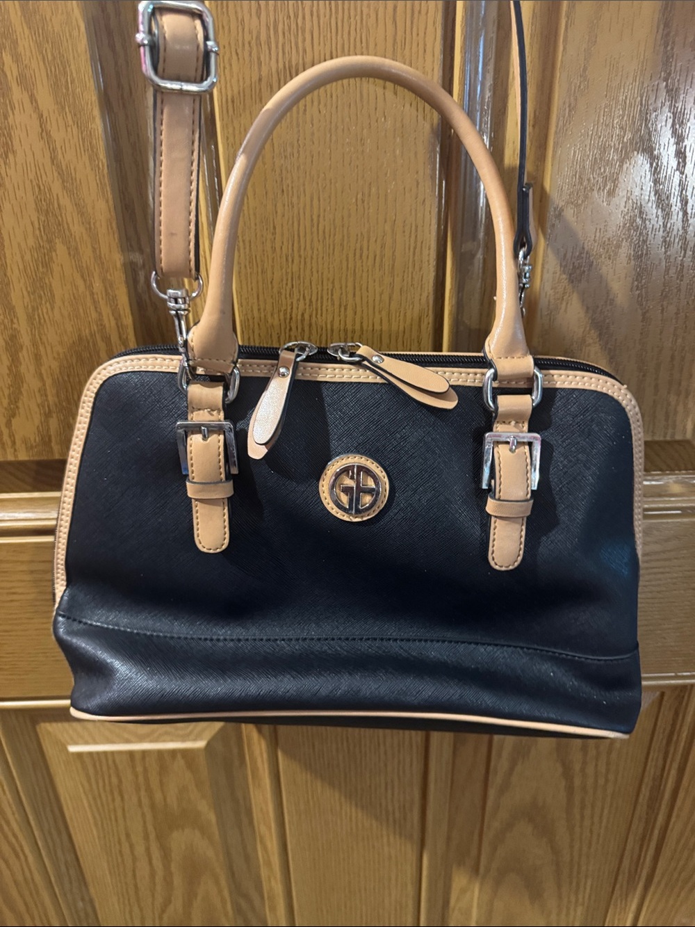 Structured Black Dome Satchel with Tan Trim and Top Handles